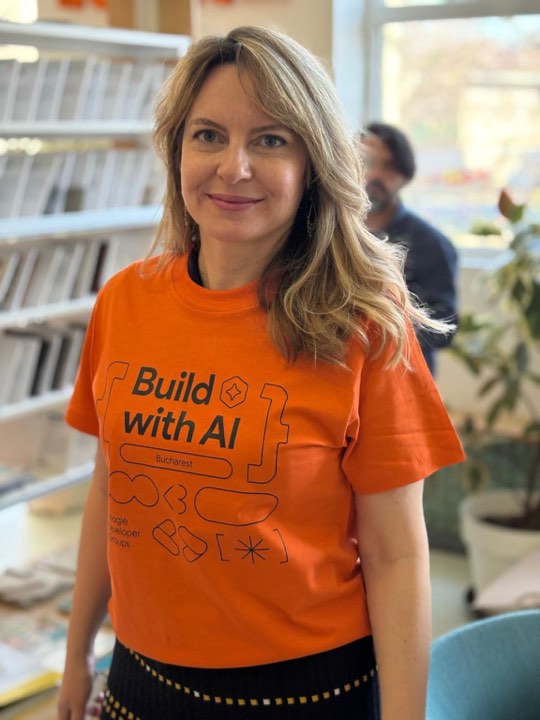 Adina Zara wearing a Build with AI t-shirt